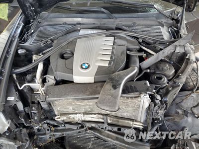 Zdjęcie 12 z 14 samochodu: 2012 BMW X5 XDRIVE35D VIN:5UXZW0C56CL673826 - miniatura