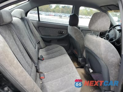 Zdjęcie 10 z 14 samochodu: 2002 HYUNDAI ELANTRA GLS VIN:KMHDN45D72U427687 - miniatura