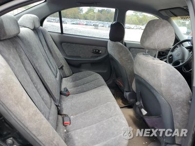 Zdjęcie 10 z 14 samochodu: 2002 HYUNDAI ELANTRA GLS VIN:KMHDN45D72U427687 - miniatura