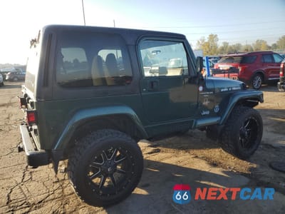 Trzecie zdjęcie samochodu z tyłu: 1999 JEEP WRANGLER / TJ SAHARA VIN:1J4FY49S5XP478358 - miniatura