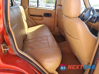 Zdjęcie 10 z 13 samochodu: 1998 JEEP CHEROKEE LIMITED VIN:1J4FJ78S8WL195644 - miniatura