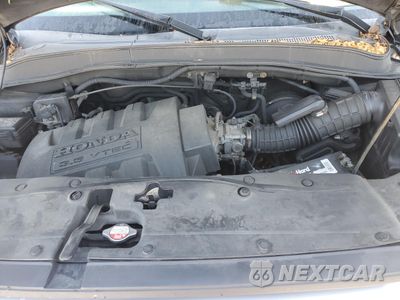 Zdjęcie 12 z 15 samochodu: 2007 HONDA PILOT EX VIN:2HKYF18417H515536 - miniatura