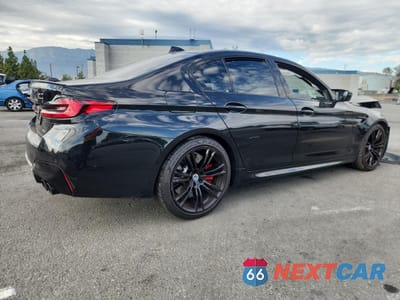 Trzecie zdjęcie samochodu z tyłu: 2023 BMW M5 VIN:WBS83CH08PCL28431 - miniatura