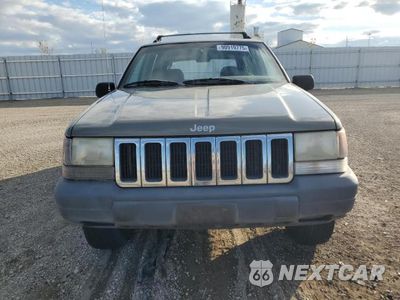 Piąte zdjęcie samochodu w środku: 1997 JEEP GRAND CHEROKEE LAREDO VIN:1J4GZ58S9VC673117 - miniatura