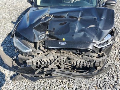 Zdjęcie 11 z 14 samochodu: 2017 FORD FUSION TITANIUM VIN:3FA6P0K91HR130162 - miniatura