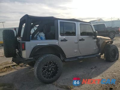 Trzecie zdjęcie samochodu z tyłu: 2014 JEEP WRANGLER UNLIMITED SAHARA VIN:1C4BJWEG0EL233817 - miniatura