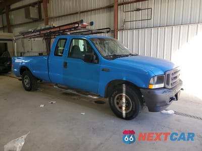 Czwarte zdjęcie samochodu z boku: 2003 FORD F250 SUPER DUTY VIN:1FTNX20L53EB33268 - miniatura