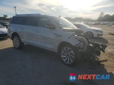 Czwarte zdjęcie samochodu z boku: 2023 LINCOLN NAVIGATOR L RESERVE VIN:5LMJJ3LG3PEL01234 - miniatura