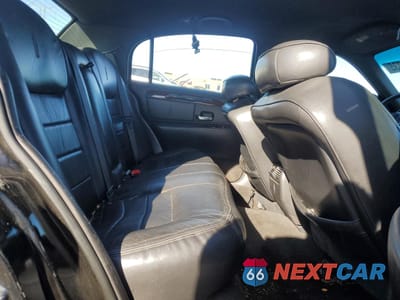 Zdjęcie 10 z 15 samochodu: 1999 LINCOLN TOWN CAR SIGNATURE VIN:1LNHM82W8XY714666 - miniatura