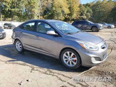 Czwarte zdjęcie samochodu z boku: 2014 HYUNDAI ACCENT GLS VIN:KMHCU4AE9EU622563 - miniatura