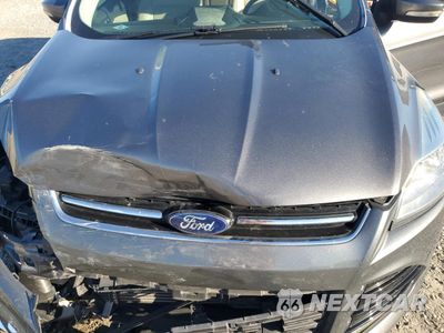 Zdjęcie 12 z 15 samochodu: 2014 FORD ESCAPE TITANIUM VIN:1FMCU0JX5EUA50661 - miniatura