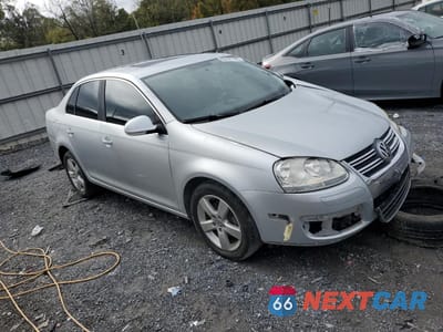 Czwarte zdjęcie samochodu z boku: 2009 VOLKSWAGEN JETTA SE VIN:3VWRM71K99M028620 - miniatura