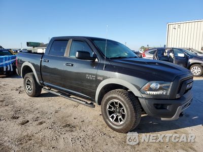 Czwarte zdjęcie samochodu z boku: 2016 RAM 1500 REBEL VIN:1C6RR7YT3GS210876 - miniatura