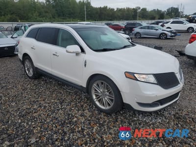 Czwarte zdjęcie samochodu z boku: 2016 LINCOLN MKT VIN:2LMHJ5AT4GBL01854 - miniatura