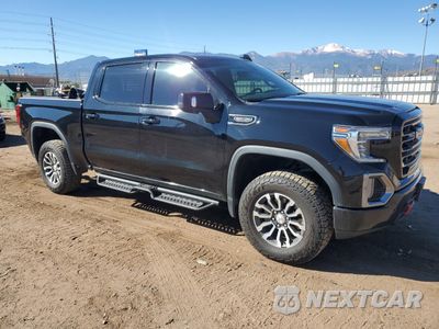 Czwarte zdjęcie samochodu z boku: 2019 GMC SIERRA K1500 AT4 VIN:3GTP9EEL4KG245404 - miniatura