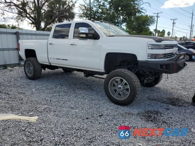 Czwarte zdjęcie samochodu z boku: 2015 CHEVROLET SILVERADO K2500 HEAVY DUTY LTZ VIN:1GC1KWE82FF667349 - miniatura