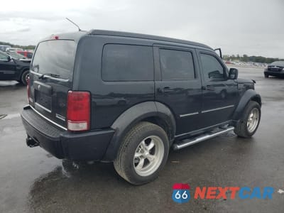 Trzecie zdjęcie samochodu z tyłu: 2011 DODGE NITRO HEAT VIN:1D4PT4GK3BW603581 - miniatura