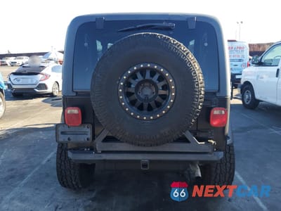Zdjęcie 6 z 12 samochodu: 2001 JEEP WRANGLER / TJ SPORT VIN:1J4FA49S51P333140 - miniatura