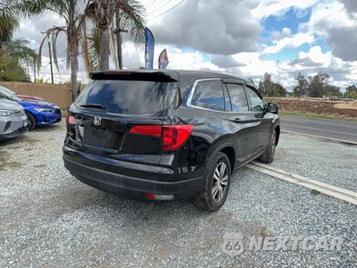Czwarte zdjęcie samochodu z boku: 2016 HONDA PILOT EXL VIN:5FNYF5H55GB040763 - miniatura