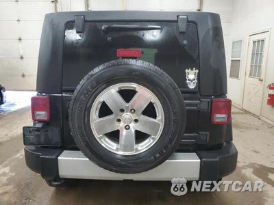 Zdjęcie 6 z 13 samochodu: 2009 JEEP WRANGLER UNLIMITED SAHARA VIN:1J8GA59189L705024 - miniatura
