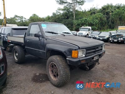 Czwarte zdjęcie samochodu z boku: 1986 TOYOTA PICKUP RN63 STD VIN:JT4RN63R4G0001992 - miniatura