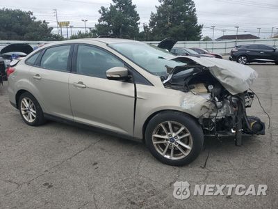 Czwarte zdjęcie samochodu z boku: 2016 FORD FOCUS SE VIN:1FADP3F28GL397916 - miniatura
