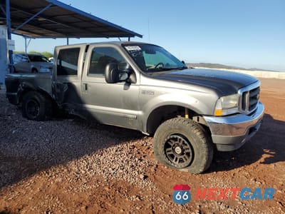 Czwarte zdjęcie samochodu z boku: 2002 FORD F250 SUPER DUTY VIN:1FTNW21F02ED60801 - miniatura