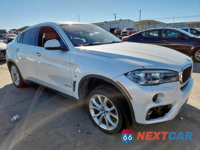 Czwarte zdjęcie samochodu z boku: 2016 BMW X6 SDRIVE35I VIN:5UXKU0C56G0F92374 - miniatura
