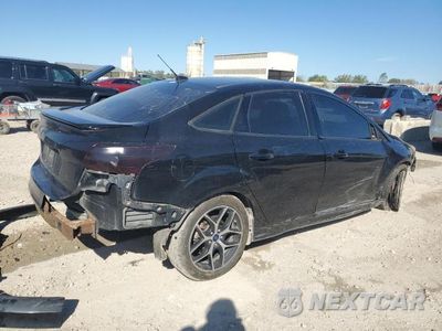 Trzecie zdjęcie samochodu z tyłu: 2016 FORD FOCUS SE VIN:1FADP3F22GL301407 - miniatura