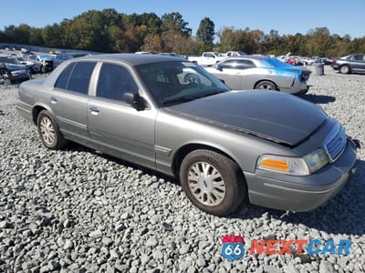 Czwarte zdjęcie samochodu z boku: 2004 FORD CROWN VICTORIA LX VIN:2FAFP74W84X150562 - miniatura