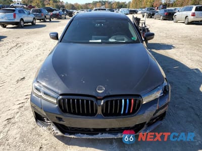 Piąte zdjęcie samochodu w środku: 2022 BMW M550XI VIN:WBA13BK0XNCJ43688 - miniatura