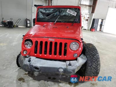 Piąte zdjęcie samochodu w środku: 2016 JEEP WRANGLER UNLIMITED SPORT VIN:1C4BJWDG3GL248669 - miniatura