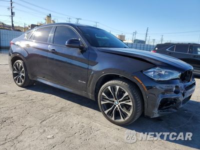 Czwarte zdjęcie samochodu z boku: 2019 BMW X6 XDRIVE35I VIN:5UXKU2C50K0Z64633 - miniatura