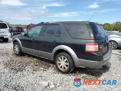 Drugie zdjęcie samochodu z przodu: 2009 FORD TAURUS X SEL VIN:1FMDK02W29GA03382 - miniatura