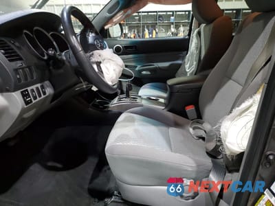 Zdjęcie 7 z 13 samochodu: 2015 TOYOTA TACOMA V6 VIN:3TMLU4EN1FM170175 - miniatura