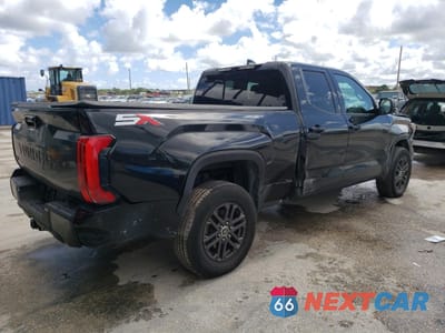 Trzecie zdjęcie samochodu z tyłu: 2023 TOYOTA TUNDRA DOUBLE CAB SR VIN:5TFLA5DA8PX090753 - miniatura