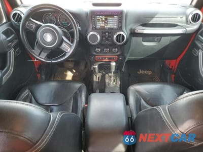 Zdjęcie 8 z 11 samochodu: 2015 JEEP WRANGLER UNLIMITED SAHARA VIN:1C4BJWEG7FL685877 - miniatura