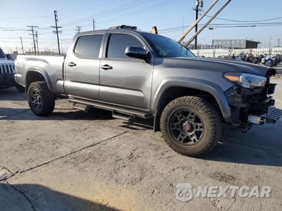 Czwarte zdjęcie samochodu z boku: 2023 TOYOTA TACOMA DOUBLE CAB VIN:3TMDZ5BN3PM143626 - miniatura