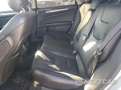 Zdjęcie 10 z 11 samochodu: 2013 FORD FUSION TITANIUM PHEV VIN:3FA6P0SU5DR274134 - miniatura