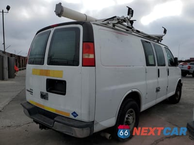 Trzecie zdjęcie samochodu z tyłu: 2014 CHEVROLET EXPRESS G2500 VIN:1GCWGFCB2E1132409 - miniatura