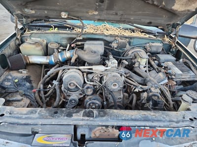 Zdjęcie 12 z 14 samochodu: 1999 CHEVROLET TAHOE K1500 VIN:1GNEK13R3XJ513285 - miniatura