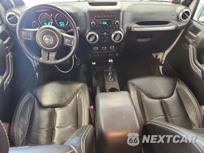 Zdjęcie 8 z 12 samochodu: 2013 JEEP WRANGLER UNLIMITED SAHARA VIN:1C4BJWEG7DL667683 - miniatura