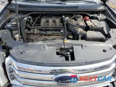 Zdjęcie 12 z 13 samochodu: 2009 FORD TAURUS X SEL VIN:1FMDK02W29GA03382 - miniatura