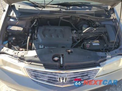 Zdjęcie 12 z 14 samochodu: 2000 HONDA ODYSSEY EX VIN:2HKRL1864YH569218 - miniatura