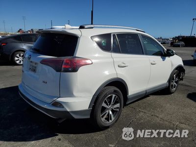 Trzecie zdjęcie samochodu z tyłu: 2016 TOYOTA RAV4 XLE VIN:JTMWFREVXGJ085726 - miniatura