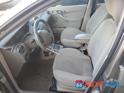 Zdjęcie 7 z 12 samochodu: 2004 FORD FOCUS SE COMFORT VIN:1FAFP34Z04W147086 - miniatura