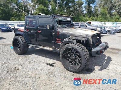 Czwarte zdjęcie samochodu z boku: 2013 JEEP WRANGLER UNLIMITED SPORT VIN:1C4BJWDG3DL605022 - miniatura