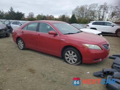 Czwarte zdjęcie samochodu z boku: 2007 TOYOTA CAMRY HYBRID VIN:4T1BB46KX7U025053 - miniatura