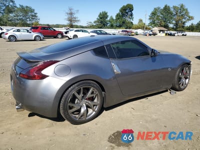 Trzecie zdjęcie samochodu z tyłu: 2014 NISSAN 370Z BASE VIN:JN1AZ4EH6EM631600 - miniatura