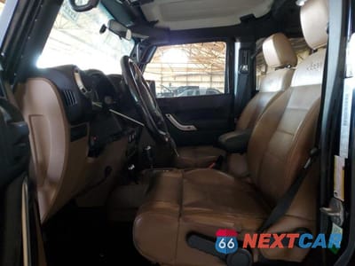 Zdjęcie 7 z 12 samochodu: 2012 JEEP WRANGLER UNLIMITED RUBICON VIN:1C4BJWFG4CL103454 - miniatura